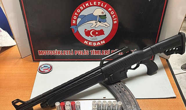 Sırtında taşıdığı halının içerisinde sakladığı ruhsatsız av tüfeğiyle yakalandı