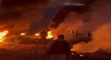 Meyveleri zirai don vurmasın diye ateş yakıp nöbet tutuyorlar