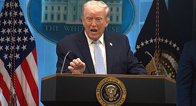 Trump'tan silahlı fotoğrafla İran'a mesaj: Yakında akıllansalar iyi olur