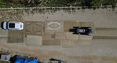 Yollarda eskitilip, antika görünümü kazandırılan Demirci halıları, Avrupa'ya ihraç ediliyor