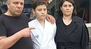 Kulüple ilişiği kesilen milli karatecinin babasından belediyeye siyah çelenkli protesto