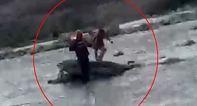 Çayın su seviyesi yükselince kayanın üzerinde mahsur kalan çocuk kurtarıldı