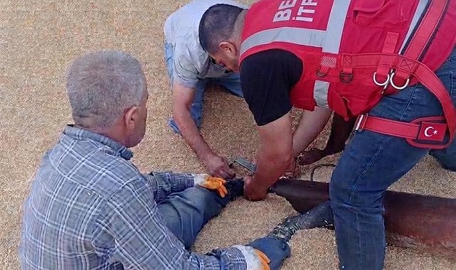 Helezon makinesine ayağı sıkışan çiftçi yaralandı