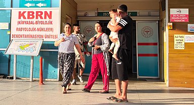 Mangaldaki ateşin üzerine düşen 2 yaşındaki Emral yaralandı