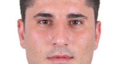 Şehit polis memurunun babaevine Türk bayrağı asıldı