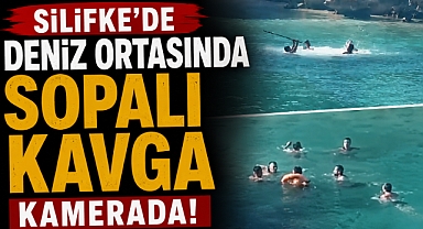 Silifke'de deniz ortasında sopalı kavga kamerada