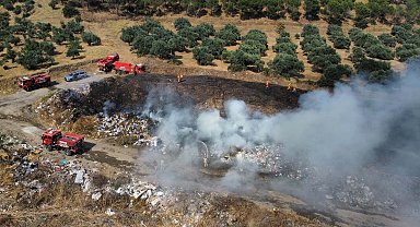 Çöplükte başlayıp, ormana sıçrayan yangın söndürüldü