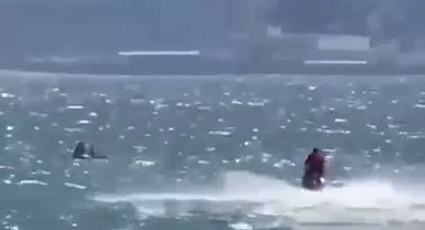Rüzgarla açığa sürüklenen SUP'taki anne ve kızı cankurtaranlar kurtardı