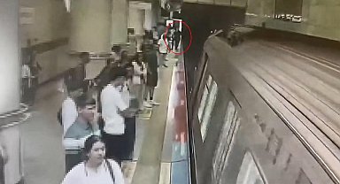 Şişli'de görme engelli Enes'in valiziyle metro raylarına düştüğü anlar kamerada