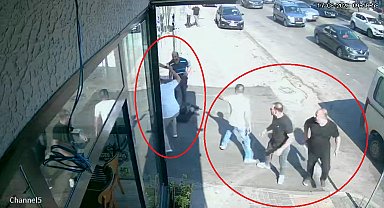 Eşiyle yolda yürürken dövülüp tabancayla vurulduğu anlar kamerada