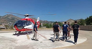 Tunceli'de parmaklarından yaralanan kadın, ambulans helikopterle sevk edildi