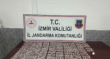 Jandarmanın durdurduğu araçta 1456 sentetik hap ele geçirildi