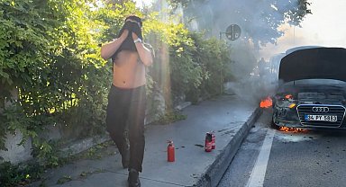 Kağıthane'de otomobil yandı; vatandaş kola şişesiyle müdahale etti