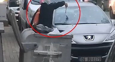 Tartıştığı kocasının otomobiline çekiçle zarar verdi